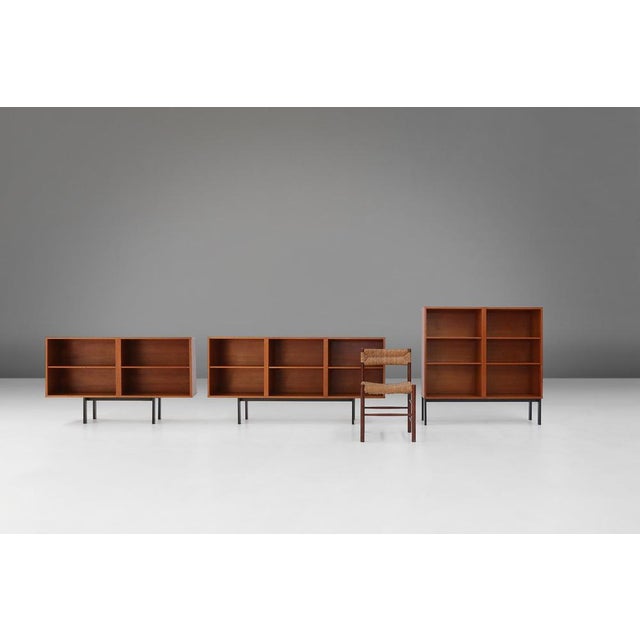 Made in Belgium in the 1960s, these mid-century cabinets combine clean lines, organic shapes and functional beauty. The...