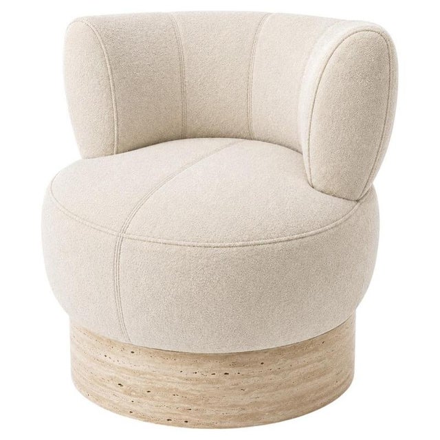 Rab armchair in wool and travertine by christophe perichon. Dimensions: ø 60 x h 80 cm. Materials: boiled wool and...