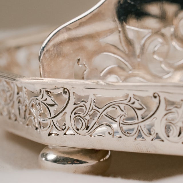This refined mid-20th-century appetizer tray combines functionality with exquisite craftsmanship. Octagonal in shape, the...