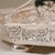 This refined mid-20th-century appetizer tray combines functionality with exquisite craftsmanship. Octagonal in shape, the...