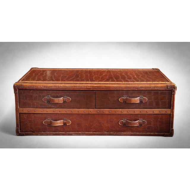 Stunning stoneyhurst large leather coffee table by timothy oulton in antique whisky. The leather have a embossed alligator...