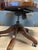 Classic mahogany desk chair with a green leather seat. Beautiful appearance and comfortable chair for daily use. The chair...
