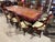 An exquisite showcase of Old World craftsmanship, this Italian double pedestal dining set embodies timeless elegance and...