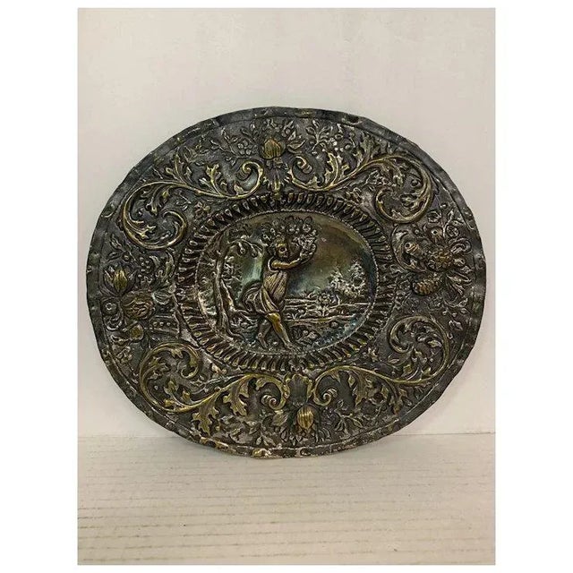 Embossed silver on copper plaque of flower girl and flowers. W: 11.75" H: 10.5"