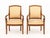 Pair of Louis Philippe Walnut Upholstered Fauteuils, 19th century, each with cream upholstery and scrolling armrests. 36"...