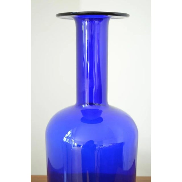 "Gulvase" the bottle-shaped vase was designed around 1965 by the designer Otto Brauer for the Danish glass manufacturer...