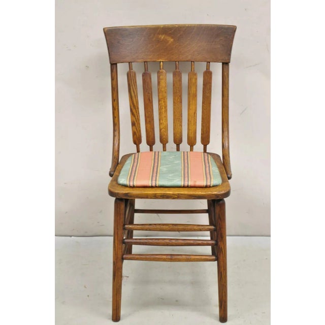 Antique Mission Arts & Crafts Oak Bentwood Slat Back Dining Side Chair with Hard Seat Cushion. Circa Early 20th Century....