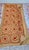 Hand-embroidered silk coverlet from India, likely Gujarat or Rajasthan, mid-to-late 20th century. A grid of concentric...