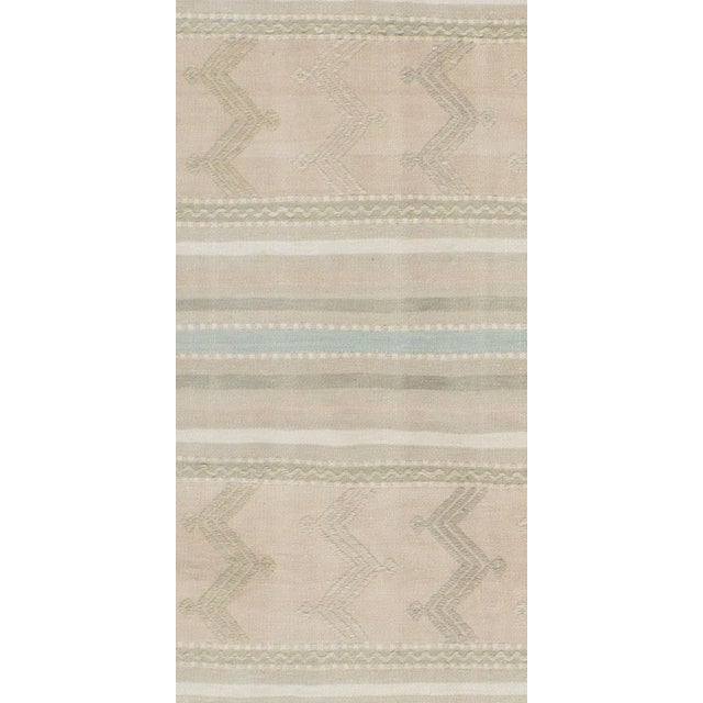 This vintage Turkish flat weave Kilim is hand-woven. The simplicity and boldness of this piece can also give a...