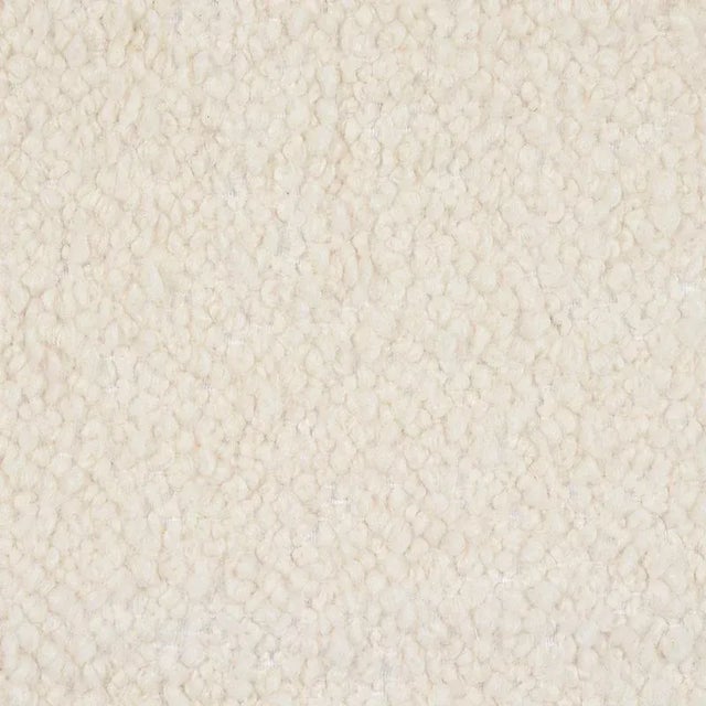 Extra-long loops of twisted yarn create a boucle with a classic m√©lange effect and an enveloping, fleecy softness. Sold...