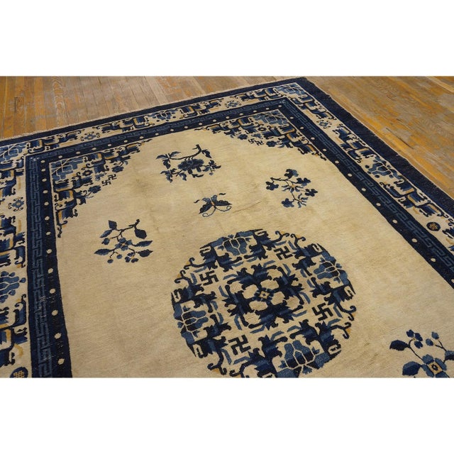 Wool 1920s Blue Ivory Beige Cream White Hand Knotted Pile Rectangle Antique Rug, Circa Date: 1920s. This exquisite example...