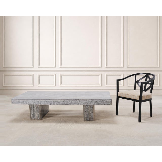 A striking and rare modern “Glacier” coffee cocktail table designed by Timothy Oulton. Hand-crafted from massive burnt...