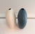A striking pair of contemporary Portuguese ceramic vases by Sporvil Ceramics. Featuring a sculptural open-center “donut”...
