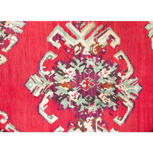 A fantastic vintage Turkish Bessarabian Kilim rug with the most wonderful large-scale stylized floral medallions living...