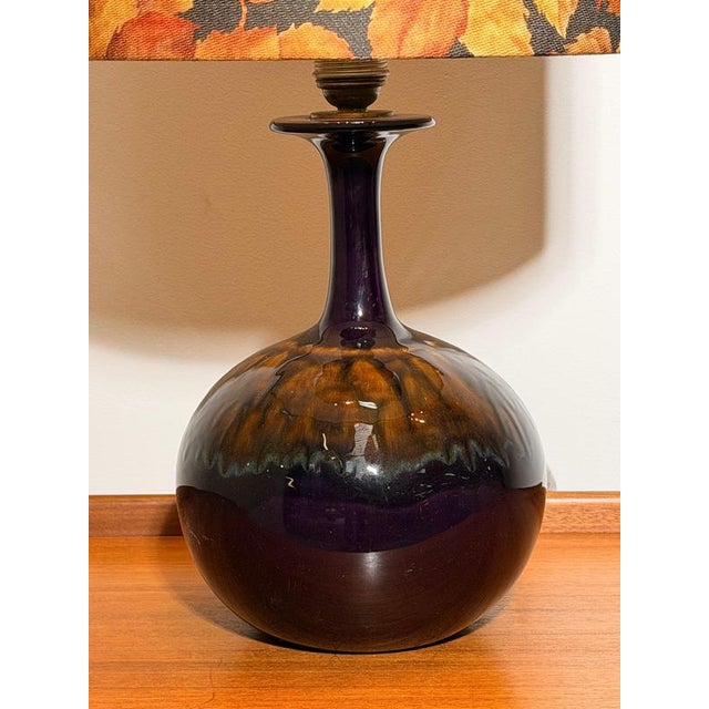 Elegant vintage table lamp by Rosenthal Studio-Line, featuring a sculptural handblown glass base in deep aubergine and...