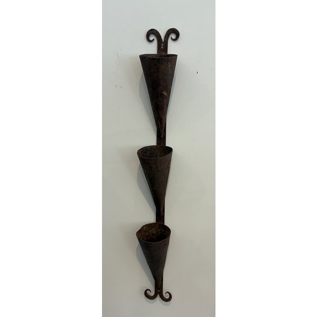 Vintage metal wall hanging decorative plant holder. This wall hung planter is the perfect display opportunity for...