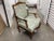 This is an exceptional pair of French walnut fauteuils, or side-chairs. With exquisitely carved frames, these chairs were...