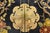 Vintage Chinoiserie cabinet painted with a black gloss lacquer with hand painted nature motifs on each side. It features...