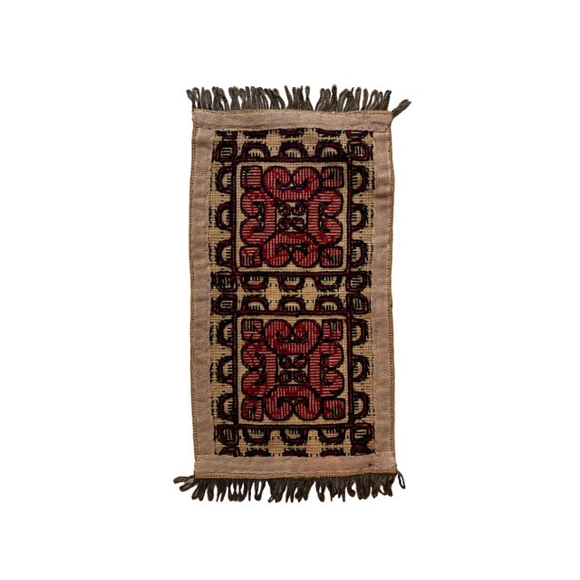 Vintage hand-embroidered folk art textile mat or small runner. Features two large central medallions and a metallic looped...