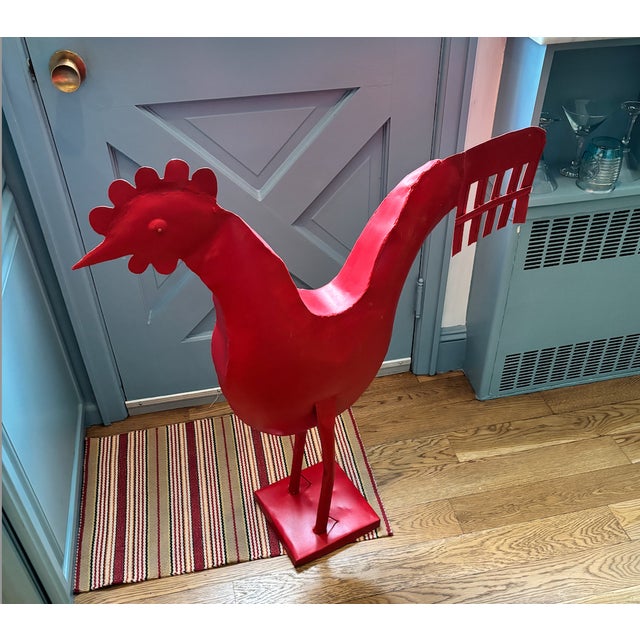 Red Metal Rooster for indoor use.