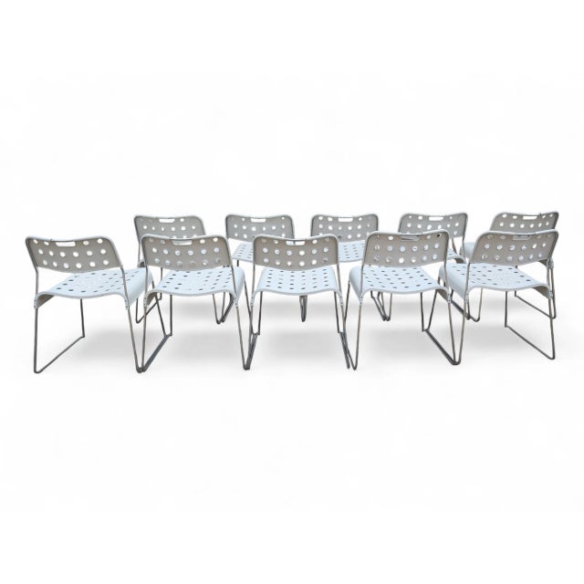 A set of stackable chairs with an iconic, modern, industrial design, produced by Bieffeplast (Padova), Italy. The chairs...