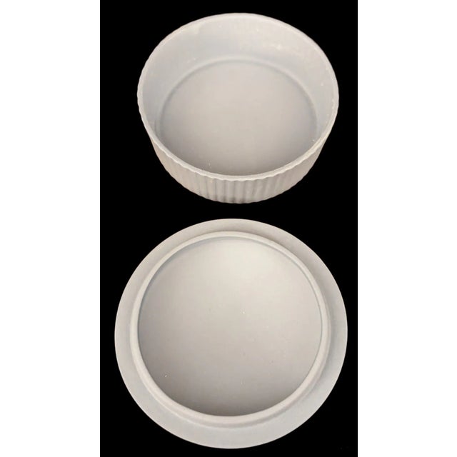 Add a touch of timeless English elegance to your vanity or shelf with this exquisite Wedgwood Jasperware round lidded box....