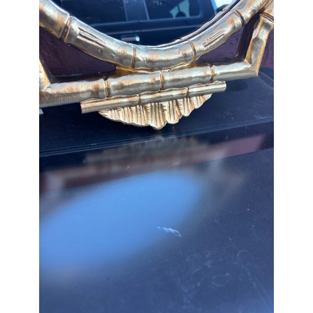 Faux Bamboo Gold Painted Mirror that would add a great touch to any space .