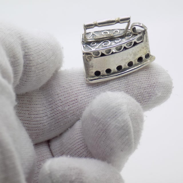 A delightful vintage miniature depicting a traditional fabric iron, handmade in Arezzo, Tuscany, Italy between the 1980s...