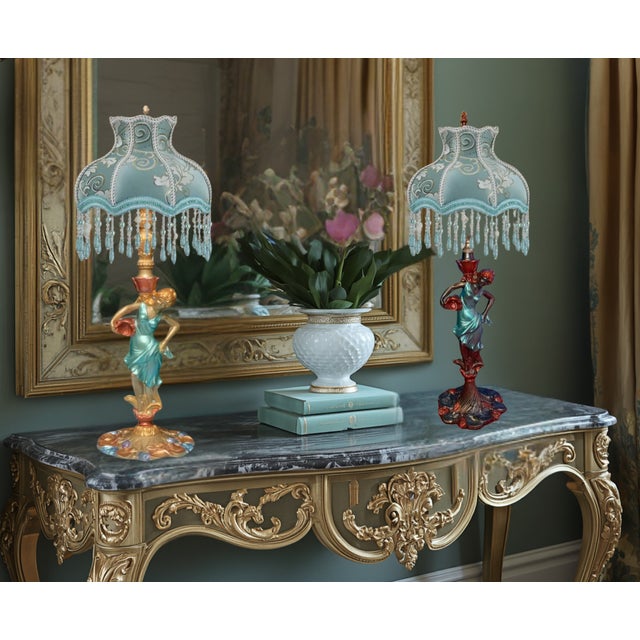 Each exquisite mid-century spelter lamp showcases enchanting water nymphs, adorned in identical diaphanous gowns of...