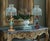 Each exquisite mid-century spelter lamp showcases enchanting water nymphs, adorned in identical diaphanous gowns of...