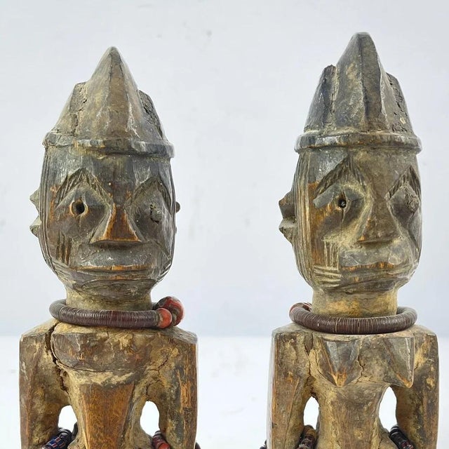 Ibeji figures, carved by the Yoruba people of Nigeria, are wooden twin sculptures holding cultural significance in Yoruba...