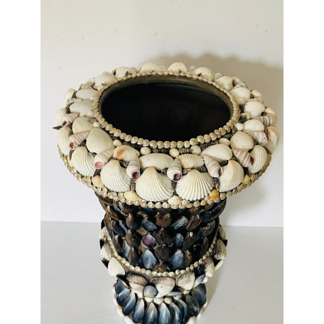 Dramatic black and White Sea Shell encrusted planter.