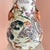 This is a beautiful large Chinese vase that is hand-painted in the “100 deer” motif, and displays scenic landscapes filled...