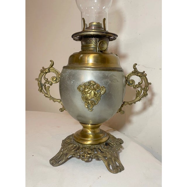 Up for sale is a nice quality antique 19th century Art Nouveau electrified parlor lamp. It's made with ornate detailing...