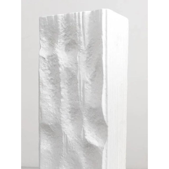 A beautiful white matte op art relief porcelain vase from the 1960s, designed by Martin Freyer, executed by Rosenthal,...