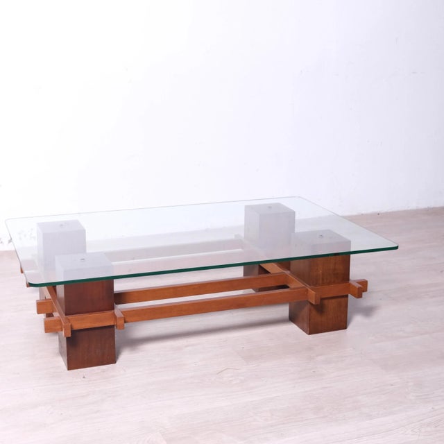 Beautiful wood and glass coffee table, Italy, 1970s. Removable glass. Dimensions: Total height 30 cm Maximum width 109 cm...