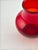A rare variation of mid-century British art glass, this ruby red glass vase was made by Whitefriars Glass, England, circa...