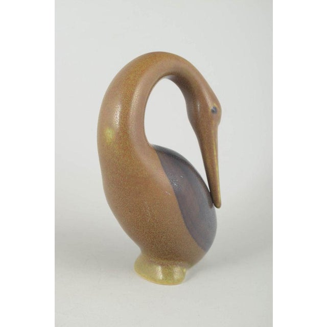 Knud Basse, Bornholm, Denmark. Stoneware Bird Figure, 1960s. Rare stoneware bird figure with the characteristic organic...
