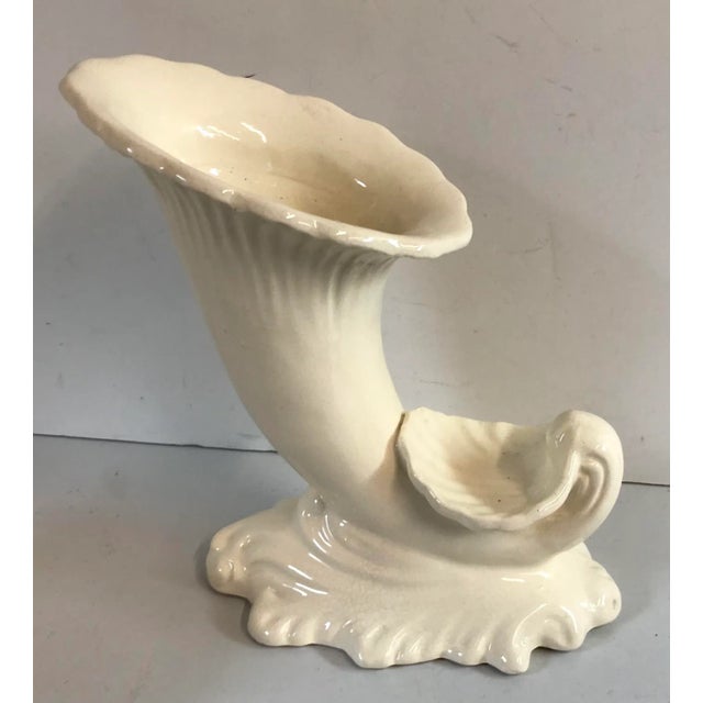 Love this cream colored cornucopia and shell shaped mid Century vase! Marked Made in Japan on bottom.