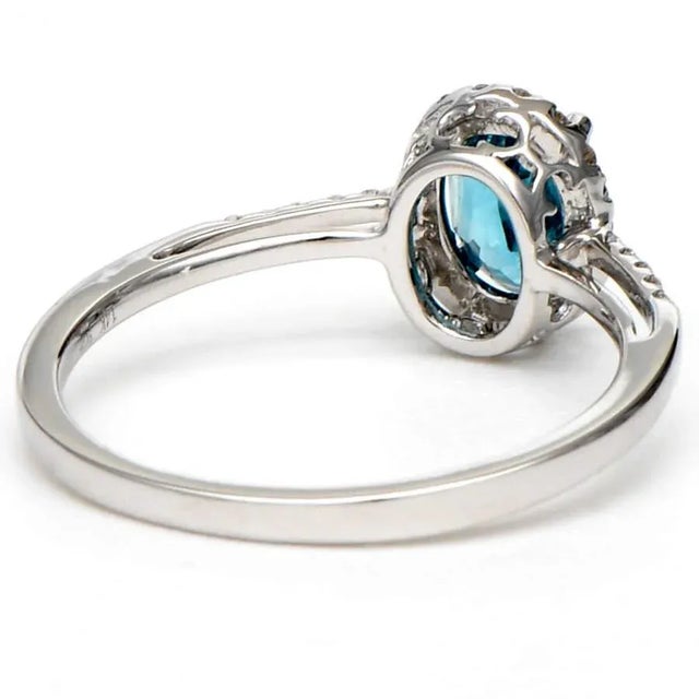 A timeless classic, this 14-karat white gold blue zircon & diamond ring is an elegant piece that will never go out of...