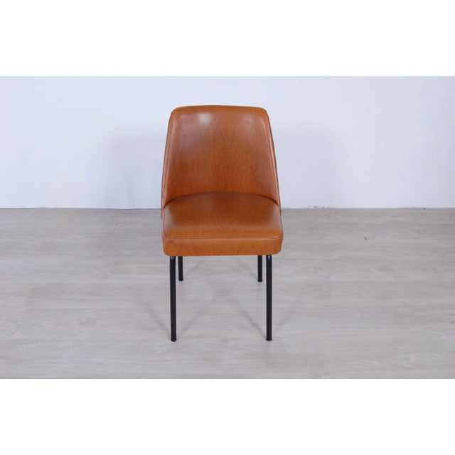 Chair Original design and manufacture 50s, not a modern-day reproduction. Structure in black enameled iron, coated seat...