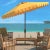 The signature white backdrop of Santorini’s lush legendary resort inspired this eleven-foot crank umbrella. Its sunny...