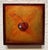 Star by Tammi Otis | Oil on Board Cherry with a Star on an Orange Background For Sale