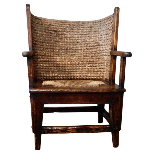 A charming antique Scottish child's Orkney chair displaying the distinctive vernacular character associated with...
