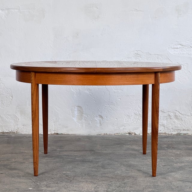 This round dining table is a quintessential piece of british mid-century furniture, manufactured by g-plan as part of...