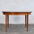 This round dining table is a quintessential piece of british mid-century furniture, manufactured by g-plan as part of...