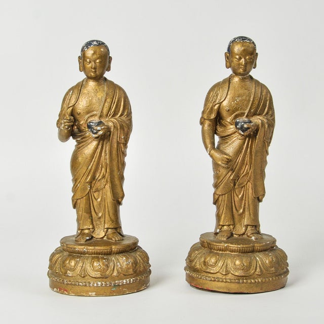 An interesting pair of standing Buddhist monk (bhikkhu) figures, most likely representing Ananda and Kashyapa — the two...