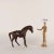 Papier -mâché horse covered in leather with metal elements. This piece is attributed to the mentioned designer/maker. It...