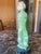 1980s Geisha Figurine Holding Flowers in Faux Jade For Sale - Image 6 of 12