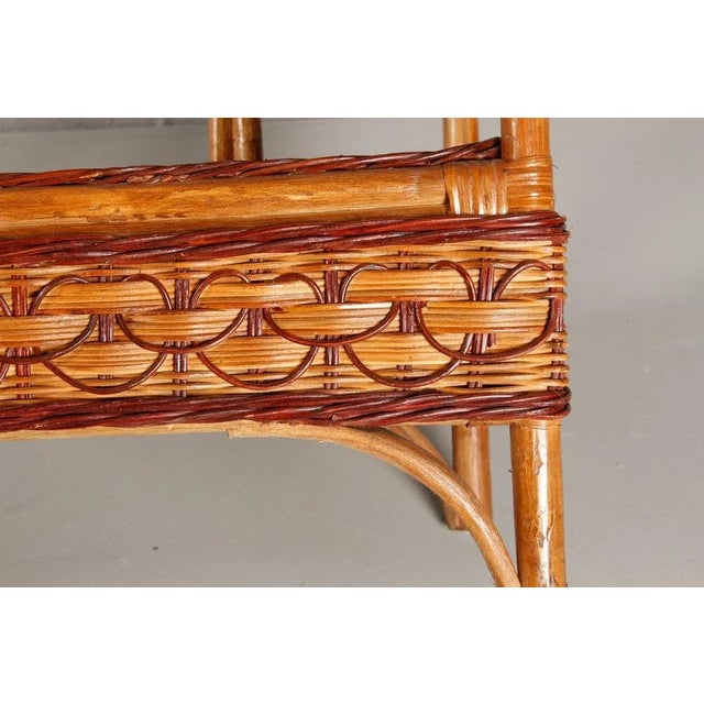 Shelf from wicker, manufactured in Germany in the 1940s/1950s. Very good condition with beautiful age spatina. Width 72 cm...